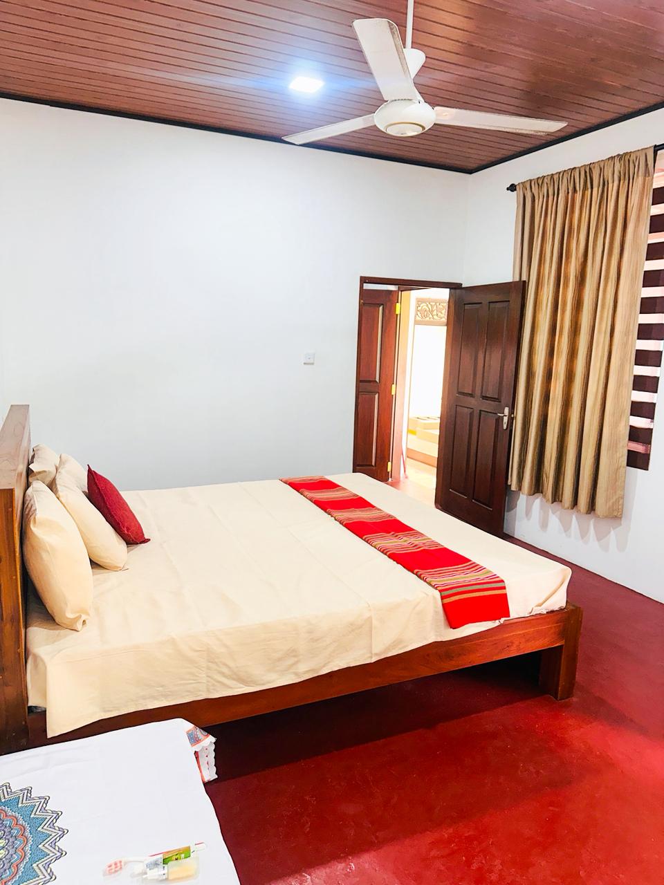 Room B - Two single beds with modern decor